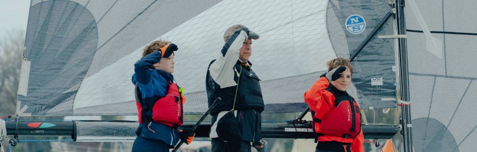 Chris sailing with Youth sailors on a VXOne