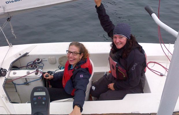 Smiling faces after sailing in Toronto Harbour DSAO sailing member Jody and volunteer Amanda arriving back at the dock after an amazing sail in Toronto Harbour